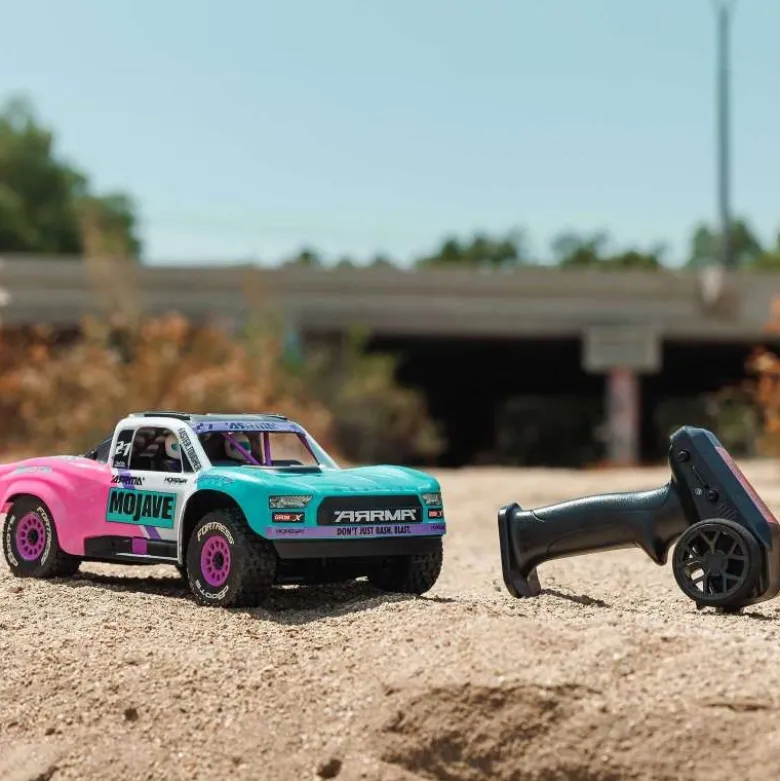 ARRMA ARA2304ST1MOJAVE GROM 223S BLX 4X4 Small Scale Desert Truck RTR teal inkl. Akku und Ladegerät