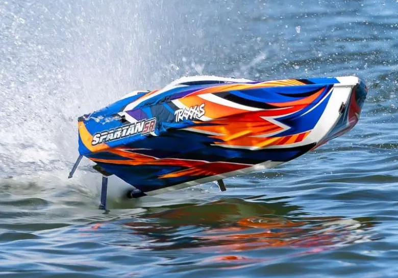 Traxxas 103076-4-ORNGSET1SPARTAN SR 36-Zoll Rennboot Brushless RTR, orange Set 1 mit Traxxas Duo Ladegerät + 2x 3S LiPo-Akku 5000mAh